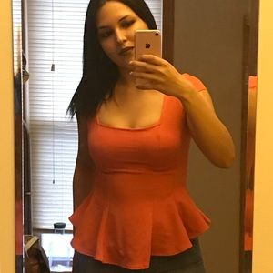 Salmon colored peplum top